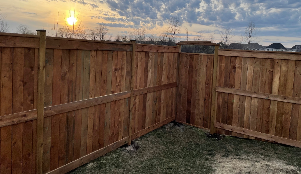 Wooden privacy fence with gate