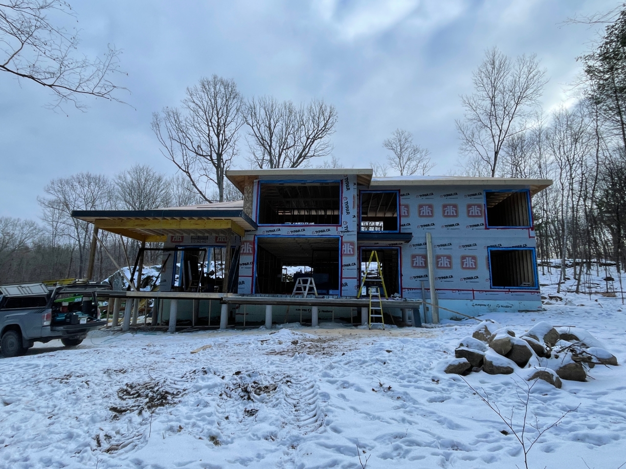 House under construction in winter.