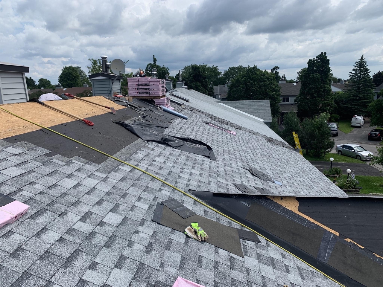 Asphalt roof being replaced.
