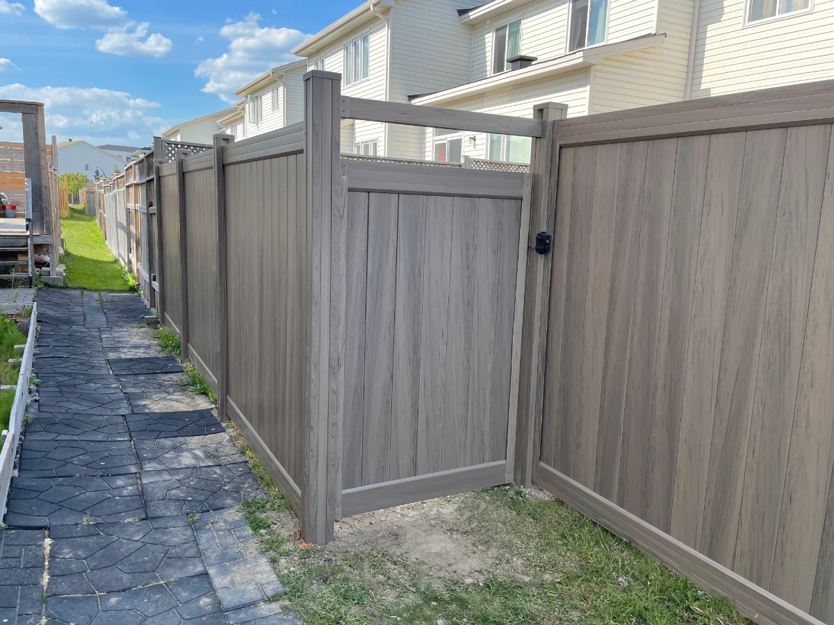 Newly installed fence with gate.